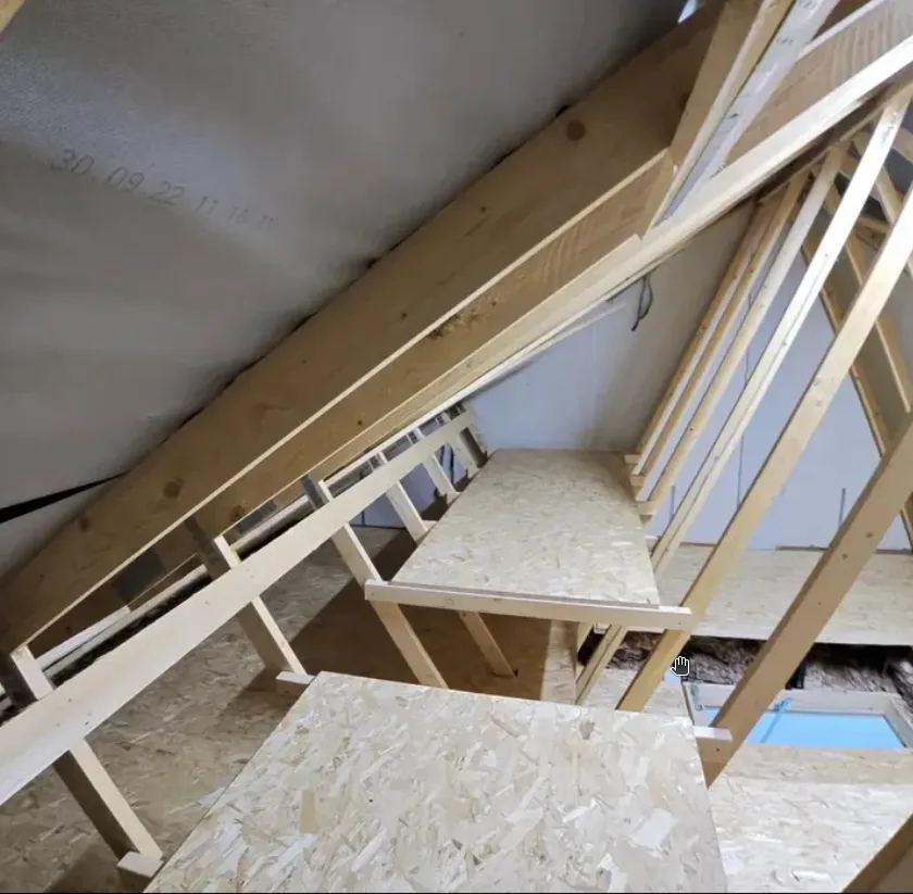 Truss shelving fitted between roof trusses for extra storage
