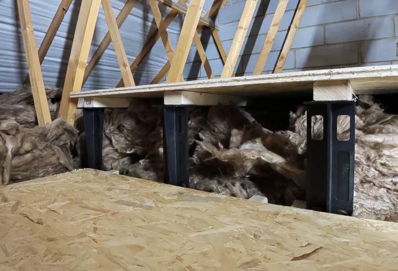 Loft boarded with raised flooring above the insulation